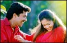 Surya and Jyotika in Poovellam Kettupaar