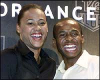 Marion Jones (L) and her boyfriend Tim Montgomery