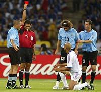 Thiery Henry is shown the red card